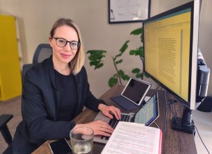 U.S. Scholar working at computer